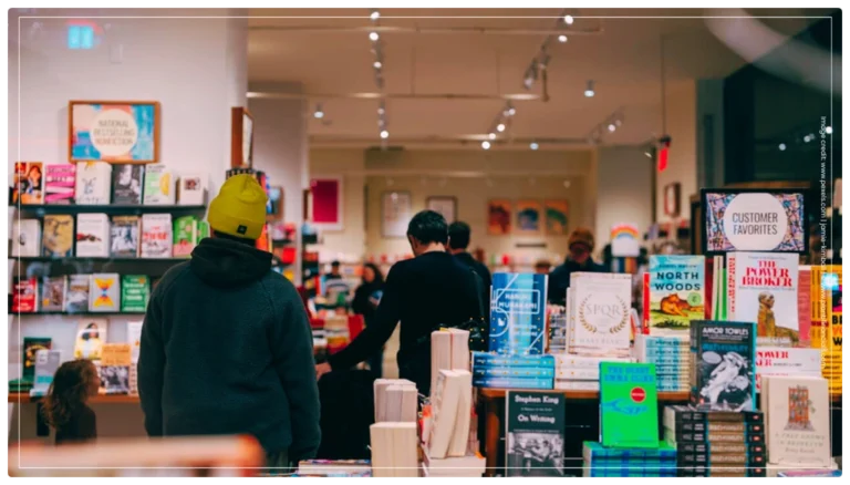 People browsing and buying books in a bookstore